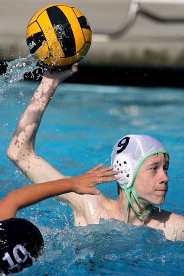 Duncan Frederick (9) fires a shot on goal on Saturday at Palisades High School. A tenth-grader from Venice High School, Frederick was among the dozens of Westside Aquatics water polo players practicing over the weekend. Rich Schmitt/Staff Photographer